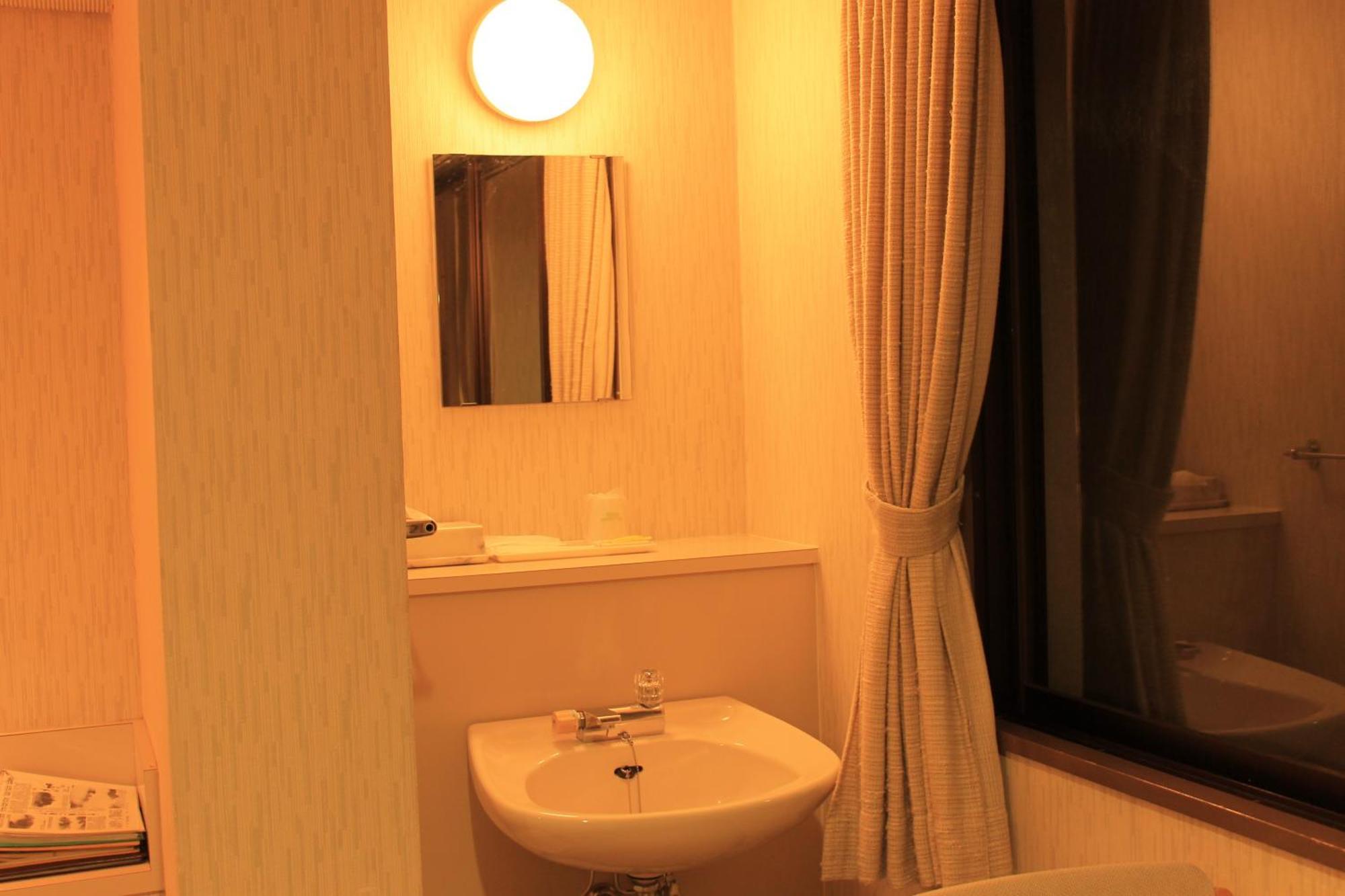 Iruka Onsen Hotel Seiryuusou Кумано Номер фото